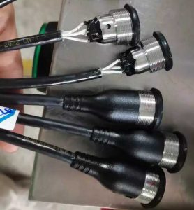 Wire harness overmolding process